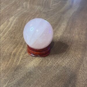 Rose Quartz Sphere on Wooden Stand